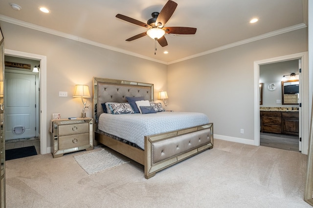 bedroom with ornamental molding, carpet, and baseboards