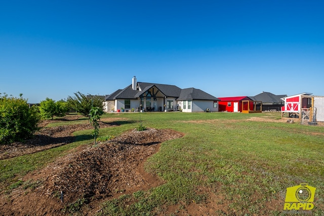 3536 Jaguar Trl, San Angelo, TX 76901 - view of grassy yard with an outbuilding