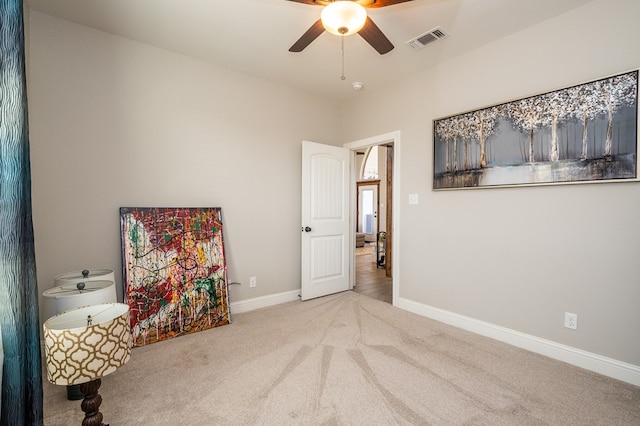 bedroom featuring a ceiling fan, baseboards, visible vents, and carpet flooring