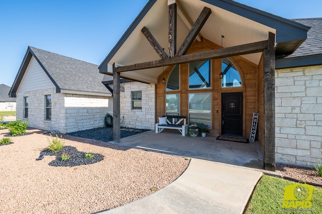 3536 Jaguar Trl, San Angelo, TX 76901 - view of front facade with stone siding and a shingled roof