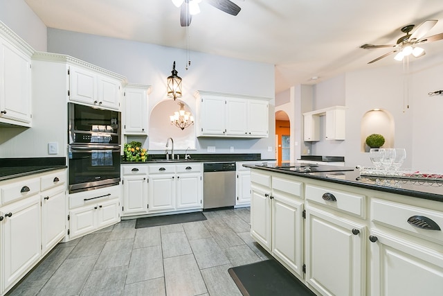 kitchen with ceiling fan, stainless steel appliances, sink, and white cabinets