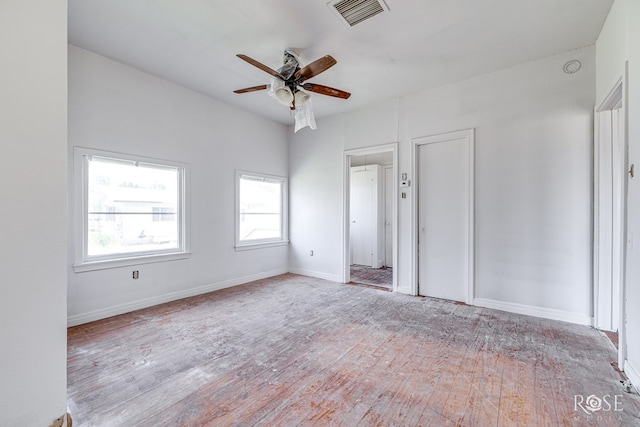 804 S Concho Ave, Sonora, TX 76950 - spare room with a ceiling fan, wood finished floors, and baseboards