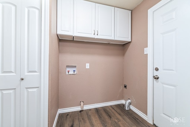 laundry area featuring dark wood-style floors, hookup for a washing machine, cabinet space, electric dryer hookup, and baseboards