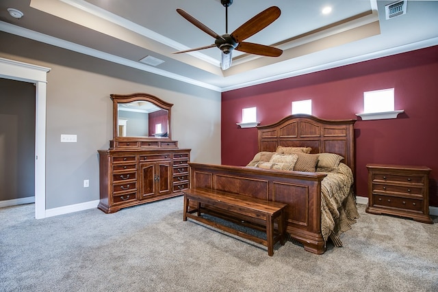 2030 Silver Creek Ct, San Angelo, TX 76904 - carpeted bedroom with a tray ceiling, ornamental molding, baseboards, and ceiling fan