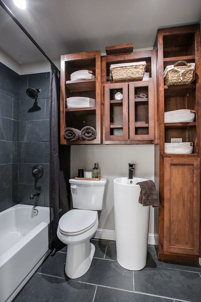 2030 Silver Creek Ct, San Angelo, TX 76904 - full bathroom featuring toilet, shower / tub combo, and tile patterned floors