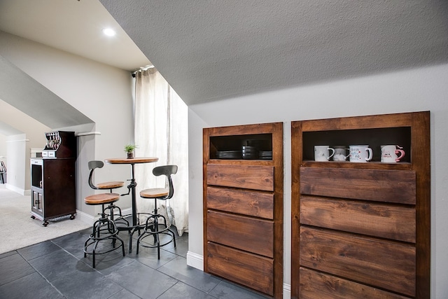 2030 Silver Creek Ct, San Angelo, TX 76904 - detailed view of a textured ceiling and baseboards