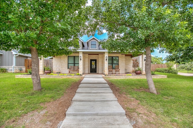 2030 Silver Creek Ct, San Angelo, TX 76904 - view of front of house featuring stone siding and a porch