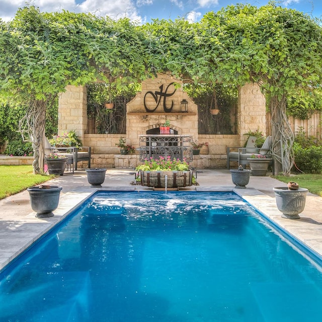 2030 Silver Creek Ct, San Angelo, TX 76904 - view of swimming pool with a patio
