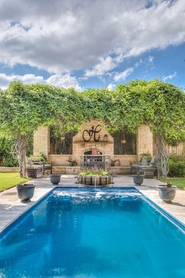 2030 Silver Creek Ct, San Angelo, TX 76904 - view of swimming pool with a patio