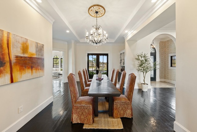 2721 Old Decatur Rd, Decatur, TX 76234 - dining area with arched walkways, wood-type flooring, a chandelier, recessed lighting, and baseboards