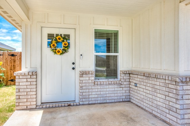 909 E 39th St, San Angelo, TX 76903 - view of exterior entry with board and batten siding