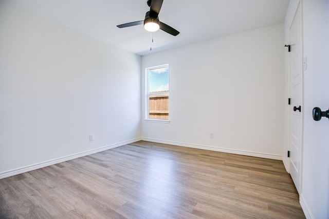 909 E 39th St, San Angelo, TX 76903 - empty room featuring ceiling fan and wood finished floors