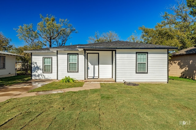 view of front of home with a front yard