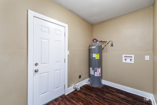 utility room featuring water heater