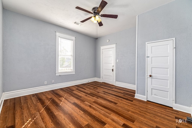 2 N Adams St, San Angelo, TX 76901 - empty room with wood finished floors, ceiling fan, and a textured wall