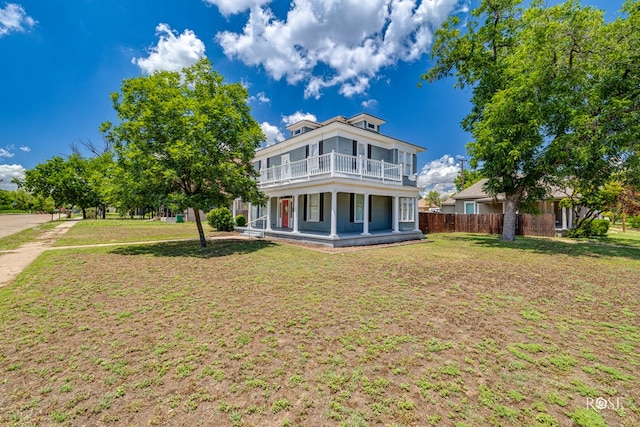 2 N Adams St, San Angelo, TX 76901 - rear view of property with a balcony and covered porch