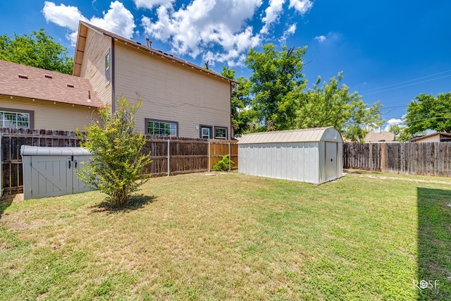 2 N Adams St, San Angelo, TX 76901 - fenced backyard with a storage unit