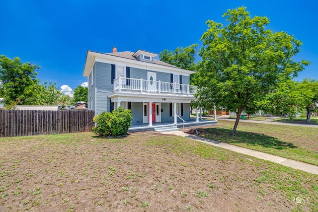2 N Adams St, San Angelo, TX 76901 - traditional style home with covered porch, a chimney, and a balcony