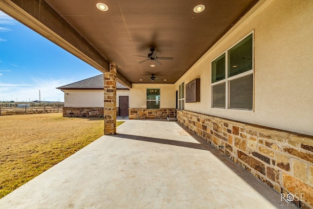 view of patio featuring a ceiling fan