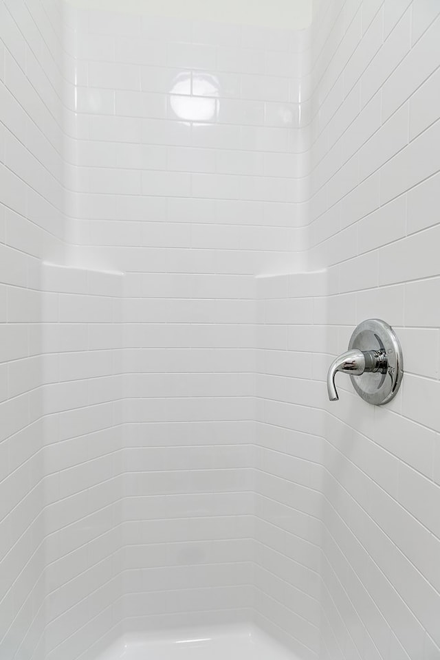 full bath featuring walk in shower