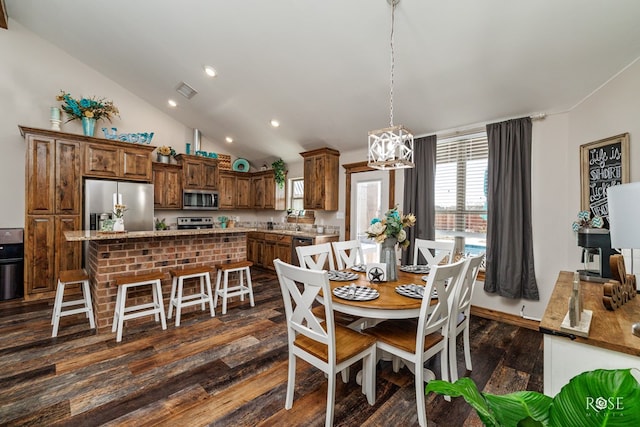 dining area featuring recessed lighting, lofted ceiling, and dark wood finished floors