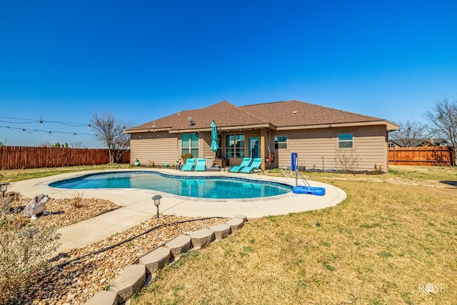 view of swimming pool featuring a fenced backyard, a fenced in pool, a patio, and a yard