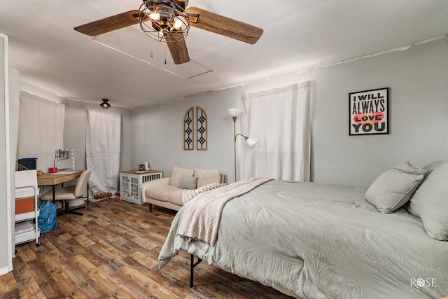 bedroom with wood finished floors and ceiling fan