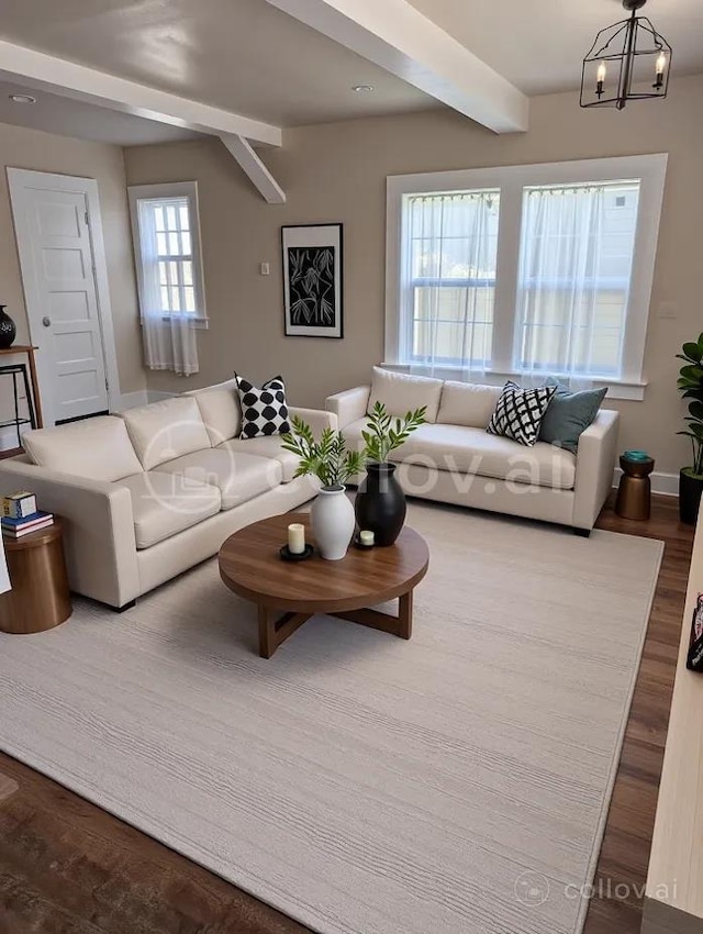 718 N Adams Ave, San Angelo, TX 76901 - living room with wood finished floors, a chandelier, baseboards, and beam ceiling