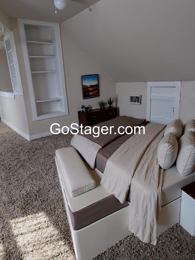 718 N Adams Ave, San Angelo, TX 76901 - bedroom with lofted ceiling and baseboards