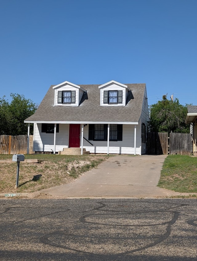718 N Adams Ave, San Angelo, TX 76901 - cape cod house with covered porch and concrete driveway