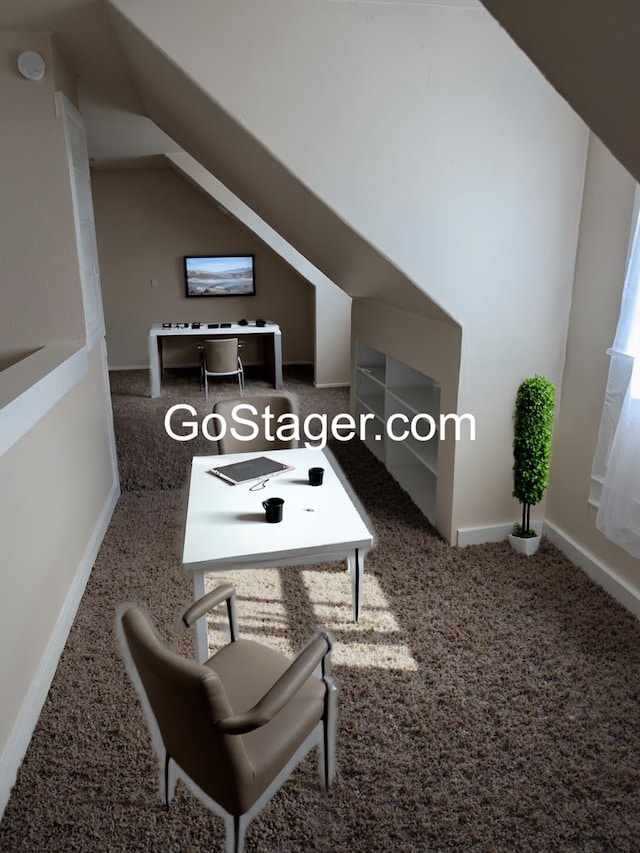 718 N Adams Ave, San Angelo, TX 76901 - living area featuring carpet and vaulted ceiling