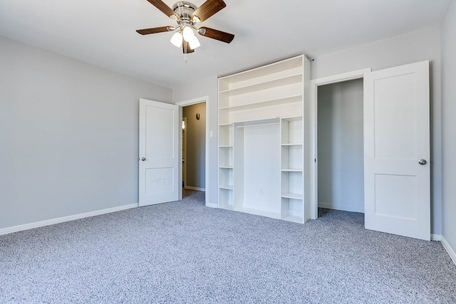 unfurnished bedroom with carpet, a closet, baseboards, and a ceiling fan