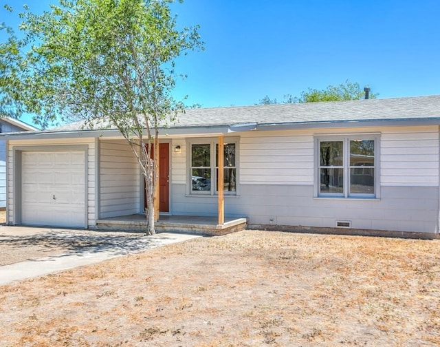 single story home featuring crawl space, an attached garage, and roof with shingles