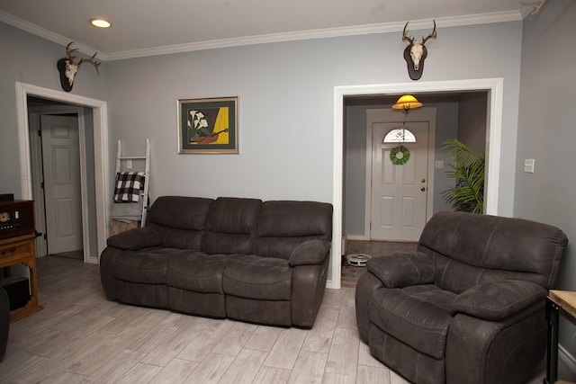 10581 Ballard Rd, San Angelo, TX 76901 - living room with light wood-type flooring, ornamental molding, recessed lighting, and baseboards