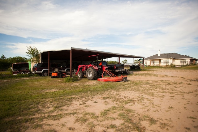 10581 Ballard Rd, San Angelo, TX 76901 - view of parking / parking lot featuring a detached carport