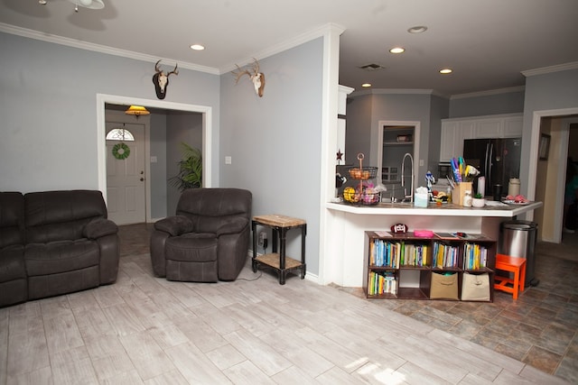 10581 Ballard Rd, San Angelo, TX 76901 - living room featuring recessed lighting and crown molding