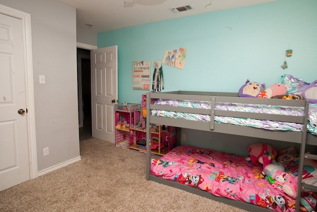 10581 Ballard Rd, San Angelo, TX 76901 - bedroom with carpet, a ceiling fan, and baseboards