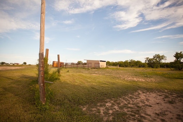 10581 Ballard Rd, San Angelo, TX 76901 - view of yard with an outbuilding and a rural view