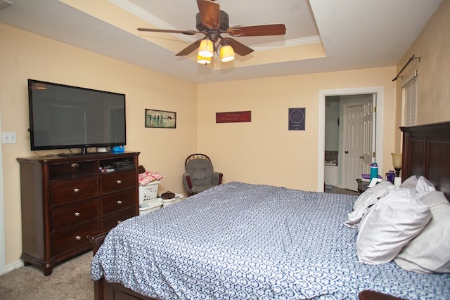 10581 Ballard Rd, San Angelo, TX 76901 - bedroom featuring light colored carpet, crown molding, a ceiling fan, and a raised ceiling