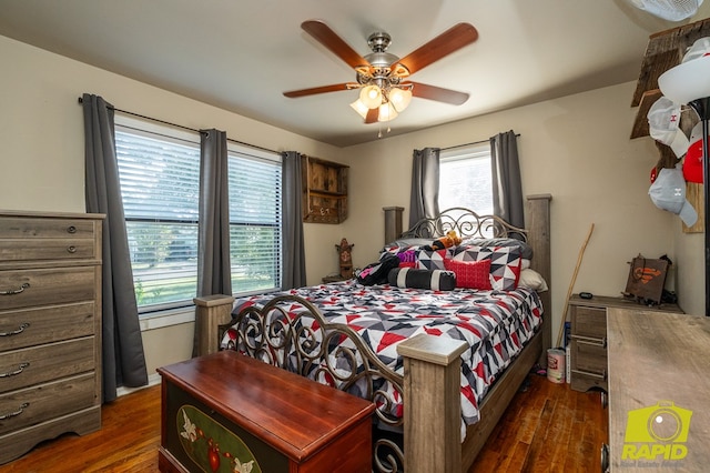 113 N Belaire Ave, San Angelo, TX 76905 - bedroom featuring dark wood-style flooring and a ceiling fan