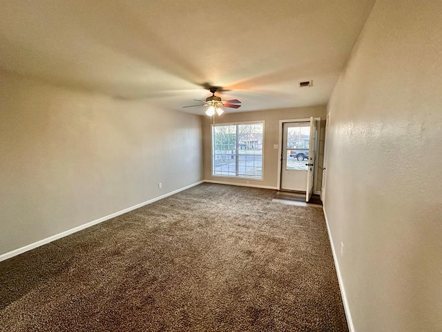 carpeted empty room with ceiling fan