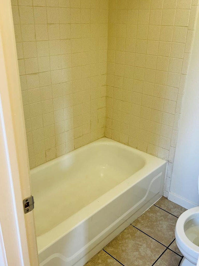 1723 Utah Ave, San Angelo, TX 76904 - bathroom featuring tile patterned floors, toilet, and baseboards