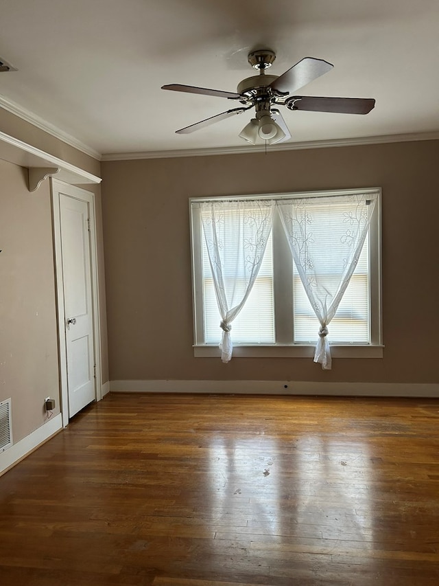 unfurnished room featuring crown molding, ceiling fan, and wood-type flooring