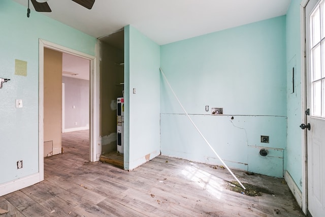 clothes washing area with hookup for a washing machine, wood finished floors, and laundry area