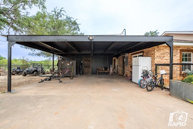 715 E Main St, Bronte, TX 76933 - view of vehicle parking featuring concrete driveway