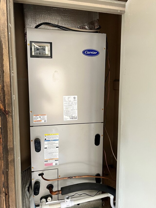 715 E Main St, Bronte, TX 76933 - utility room with heating unit