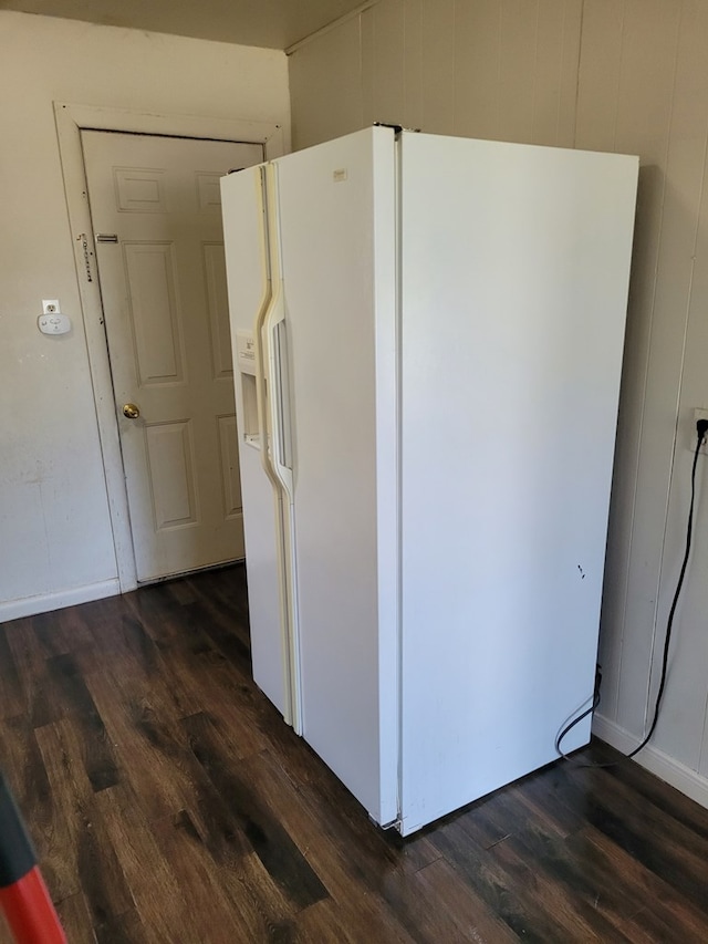405 E 41st St, San Angelo, TX 76903 - kitchen featuring white refrigerator with ice dispenser and dark wood finished floors