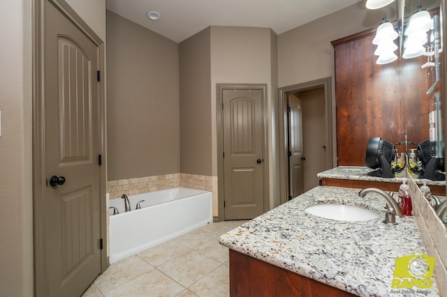 3286 Ponca Path, San Angelo, TX 76901 - bathroom featuring vanity, tile patterned floors, and a closet