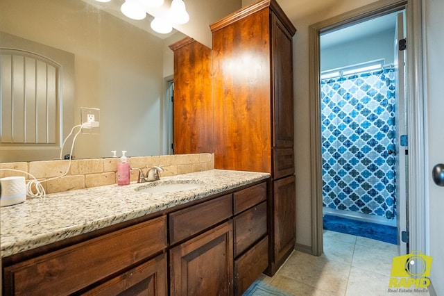 3286 Ponca Path, San Angelo, TX 76901 - bathroom with vanity, tile patterned floors, and a shower with curtain