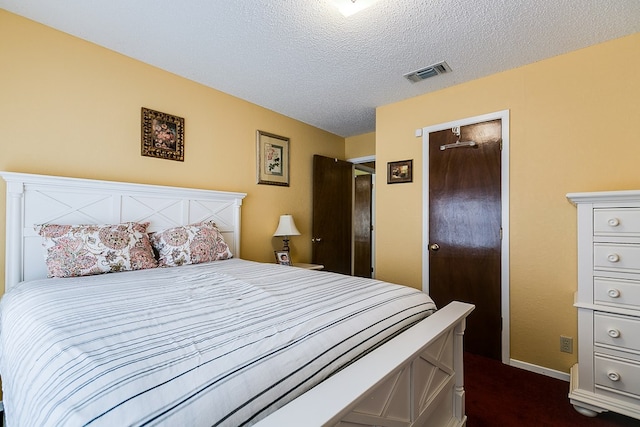 bedroom with a textured ceiling